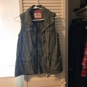 Green sleeveless jacket